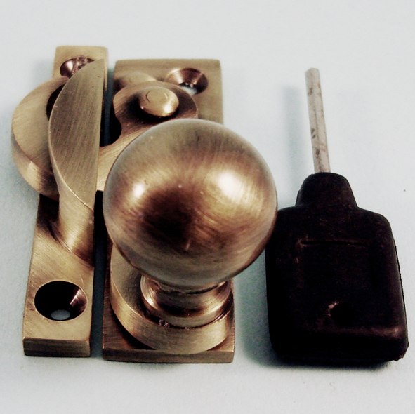 THD197L/AB • Locking • Antique Brass • Locking Clo Sash Fastener